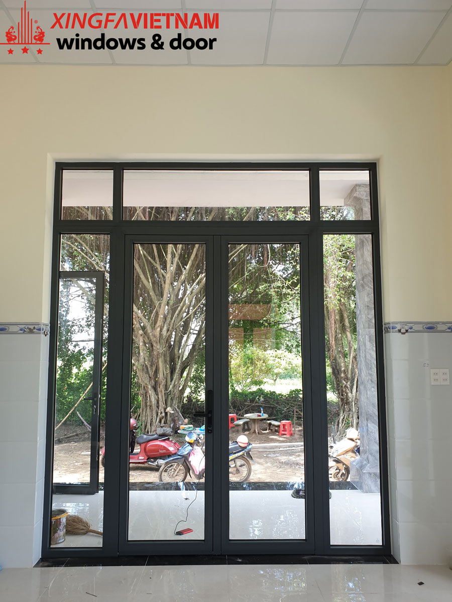 Cửa đi mở quay 2 cánh nhôm Xingfa tại nhà chị Hiền – anh Phong, Gò Dầu, Tây Ninh