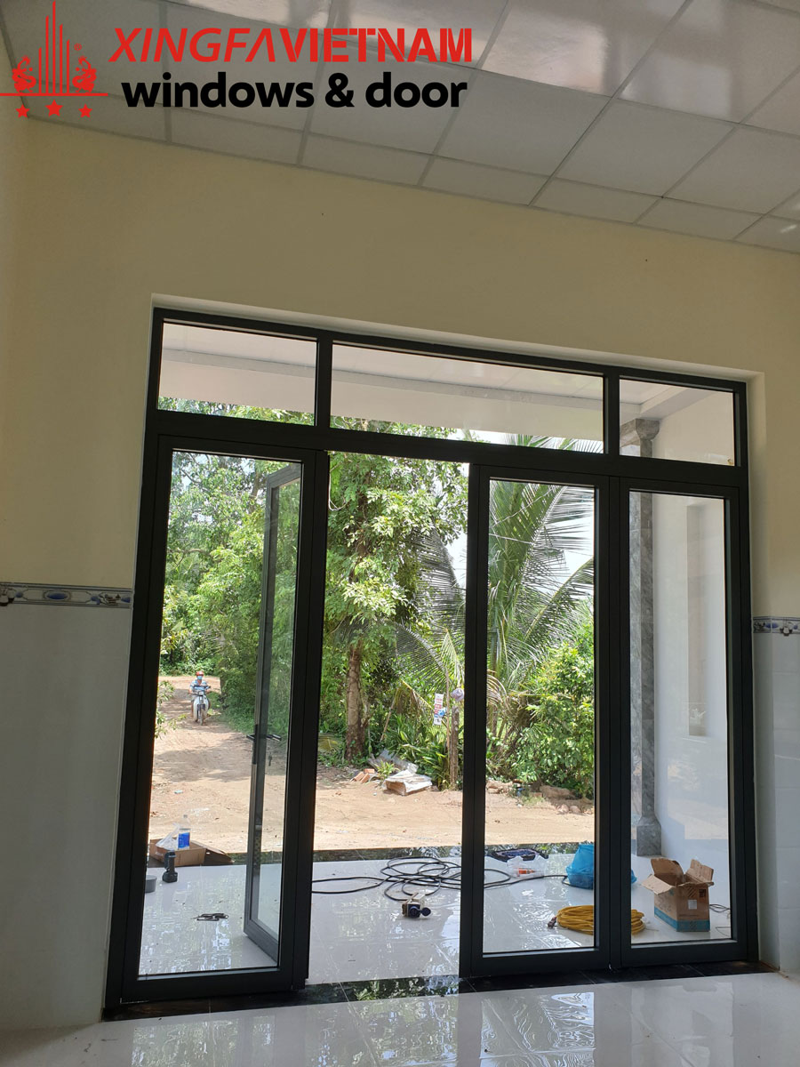 Cửa đi mở quay 4 cánh nhôm Xingfa tại nhà chị Hiền – anh Phong, Gò Dầu, Tây Ninh
