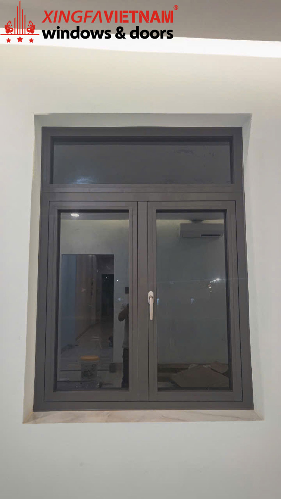 Hình ảnh thực tế hoàn thành lắp đặt cửa sổ mở quay 2 cánh nhôm Xingfa Quảng Đông