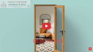 Cửa đi Mở Quay 1 Cánh Nhôm Xingfa Quảng Đông Tem đỏ Màu Vân Gỗ Bản Lề 4d